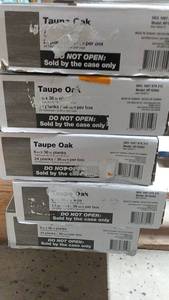 lot 144 image: 5 Cases of Traffic Master 6 in x 36 in Vinyl Planks - Taupe Oak Finish