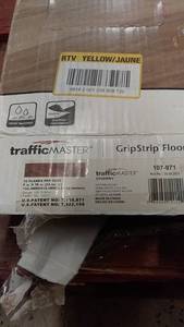 lot 160 image: TrafficMASTER GripStrip Flooring - Cherry - 16 Planks per Case