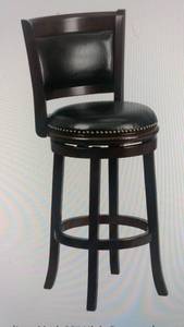 lot 4 image: Antique Black Tin Panel Back 29 Swivel Chair