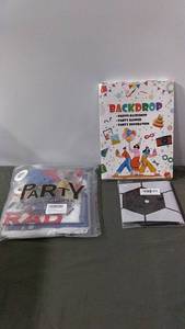 lot 112 image: Party Supplies Set - Backdrop, Banner, and Decorative Accents