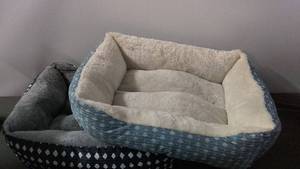 lot 115 image: Two Plush Dog Beds with Soft Interior