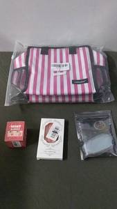 lot 137 image: Lot of 3 Makeup Products and Pink Striped Makeup Bag