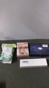 lot 195 image: Lot of 3 Personal Care Items Shower Steamers, Cracked Heel Repair Socks & Callus Scraper