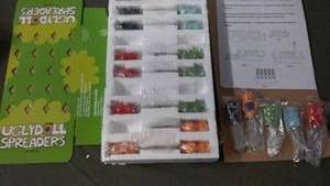 lot 200 image: Set of 10 UglyDoll Spreader Utensils with Assembly Instructions