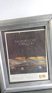lot 238 image: Framed Vintage Artwork Collection - Boy with Hat and Classic Car Advertisement