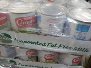 24 ct 12 oz cans Carnation Fat Free...