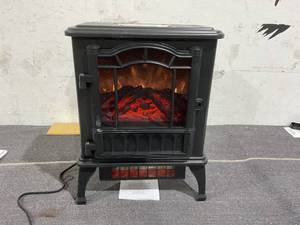 lot 75 image: Mainstays 2-Setting 3D Electric Stove Heater with Life-like Flame