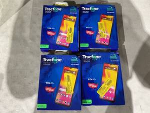 lot 460 image: LOT of 4 Tracfone Cell Phones