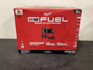 lot 707 image: Milwaukee M18 FUEL 6 Gal. Cordless WetDry Shop Vacuum with Filter, Hose, and Accessories