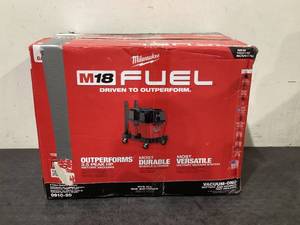 lot 708 image: Milwaukee M18 FUEL 6 Gal. Cordless WetDry Shop Vacuum with Filter, Hose, and Accessories