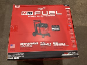 lot 711 image: Milwaukee M18 FUEL 12 Gallon Cordless DUAL-BATTERY WetDry Shop Vac Kit W12.0 Ah Battery, Charger, Filter, Hose, and Accessories