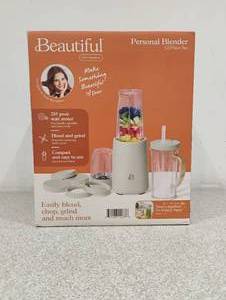 lot 33 image: BEAUTIFUL PERSONAL BLENDER 12PC SET