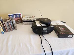 lot 53 image: Insignia CD Player & Media Collection