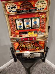 lot 1 image: Azteca Vintage Slot Machine