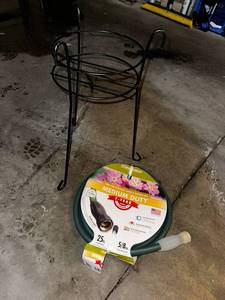 lot 19 image: Yardworks Garden Hose & Planter Stand