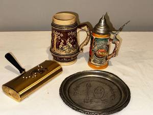 lot 227 image: Vintage Steins, Plate & Crumb Catcher Lot