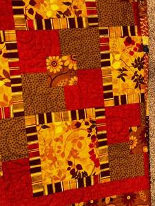 lot 251 image: Handmade Autumn Patchwork Quilt
