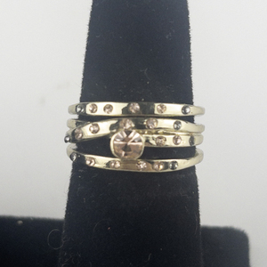 Set of three Peach & Grey Rhinestone Gold Tone Base Metal Ring Set. Size 7.5 - 7.75.