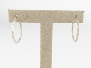 Textured Sterling Silver Hoop Earrings .