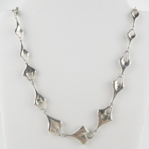 RLM Studio (Robert Lee Morris) Limited Edition Of 5,895, Bleeding Hearts Sterling Silver Necklace.  Estimated Replacement Value $295