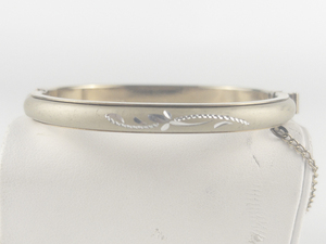 Floral Etched Matte Two Tone Base Metal Hinged Bangle.