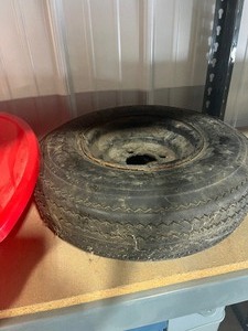 lot 42 image: Plastic Sled and Trailer Tire