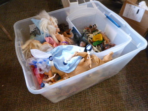 Tote of Dolls and Animal Toys