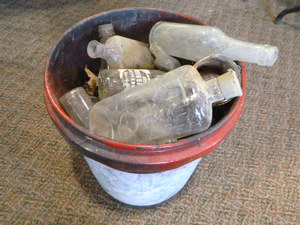 Bucket of Vintage Bottles
