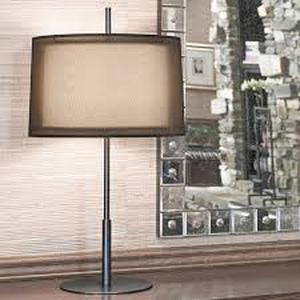 lot 6 image: One Light Table Lamp-in Deep Patina Bronze by Robert Abbey from the Saturnia collection.