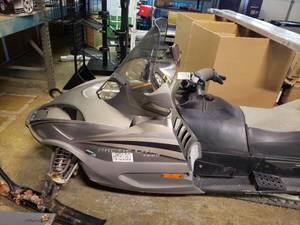 lot 129 image: Artic Cat t660 Snow Mobile FOR PARTS NO TITLE CONDIOTION OF SLED UNKNOWN