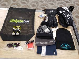 lot 180 image: Lot of gloves,  hats, Sunglasses LS2 Goggle bag and a Dakota Cat Bag