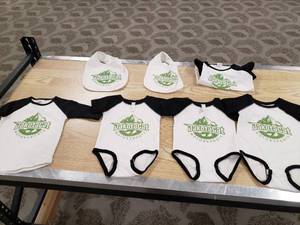 lot 215 image: YOUTH  Dakota Cat Shirts and Bibs