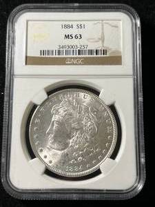 1884 US MORGAN SILVER DOLLAR NGC MS63
