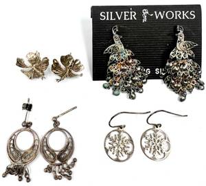 lot 21 image: Collection of Sterling Silver Earrings - 4 Pairs with Unique Designs