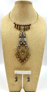 lot 27 image: Vintage Artisan Metal Necklace and Earring Set with Gold Tone Accents