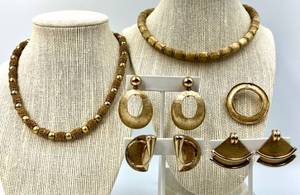 lot 45 image: Set of 4 Gold-Toned Jewelry Pieces 2 Trifari Necklaces, Pair of Round Earrings, Pair of Drop Earrings including Marvella