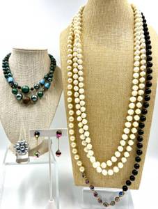 lot 49 image: Collection of Vintage Japanese Jewelry Featuring Necklaces, Clip Earrings, and Ring