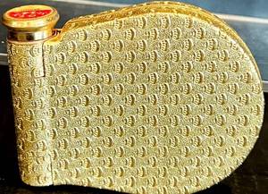 lot 100 image: Vintage Gold-Tone Coty Compact with Lipstick Holder and Mirror