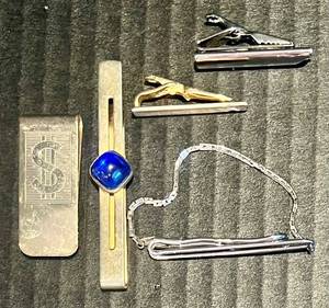lot 193 image: Set of Tie Clips and Money Clip with Unique Designs