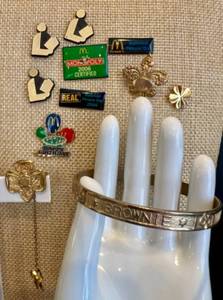 lot 196 image: Collection of 14 Vintage Lapel Pins Including McDonalds and Girl Scouts and Brownie Bangle Bracelet