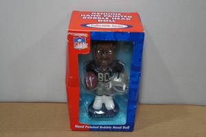 lot 6 image: Jerry Rice Genuine Hand Painted Bobble Head Doll
