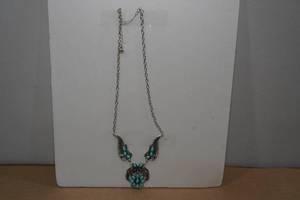 lot 37 image: Womens Silver Tone Western Feather Necklace - Turquoise Stone