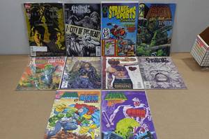 lot 147 image: 10 Comic Books -X Files, Swamp Thing, Strange Sports