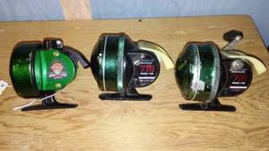 lot 537 image: Lot of 3 Vintage Johnson Fishing Reels - Model 710B and Century Annv. Ed.