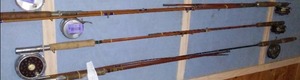 lot 599 image: Vintage Reels with Rods (4) Oren-O-Matic, Wards