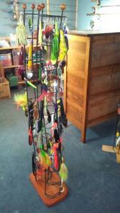 lot 608 image: Collection of Fishing Lures on Display Rack
