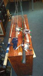 lot 614 image: Lot of 4 Vintage Fishing Rods with Reels - Shakespeare, Pflueger and More