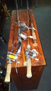 lot 616 image: Group of 4 Vintage Fishing Rods with Reels - Pflueger (2), South Bend, Johnson