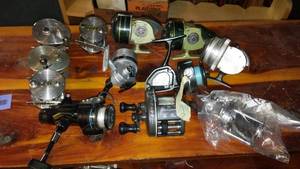 lot 640 image: Collection of 12 Vintage Fishing Reels by Shakespeare and Other Brands