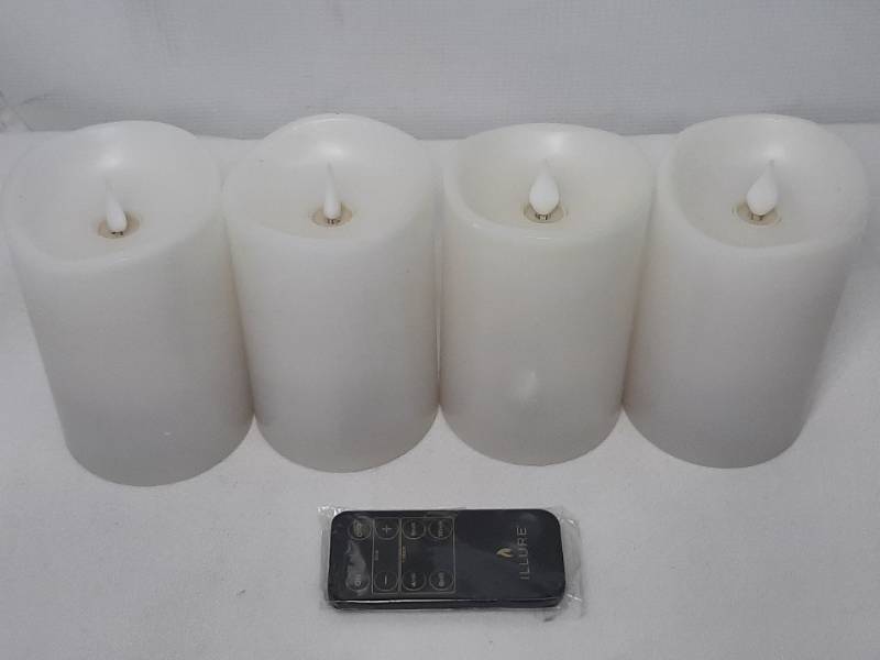 lot 705 image: Illure 4-Pack 5 Inch Lumi360 Battery Operated Candles White w Remote